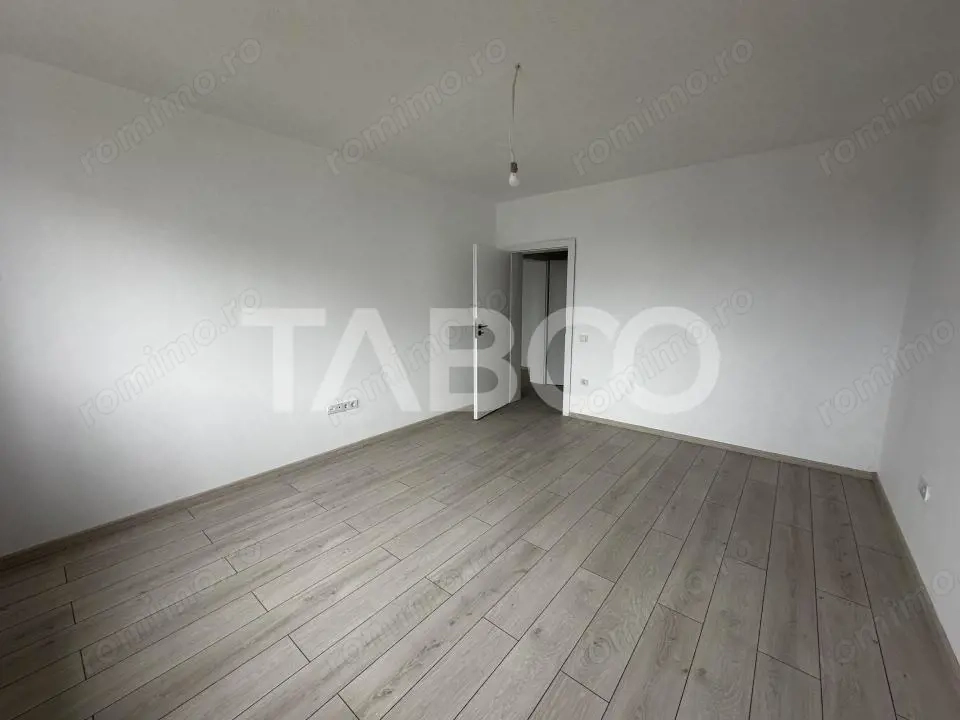 Apartament decomandat de vanzare 52 mpu 2 camere 2 logii loc parcare