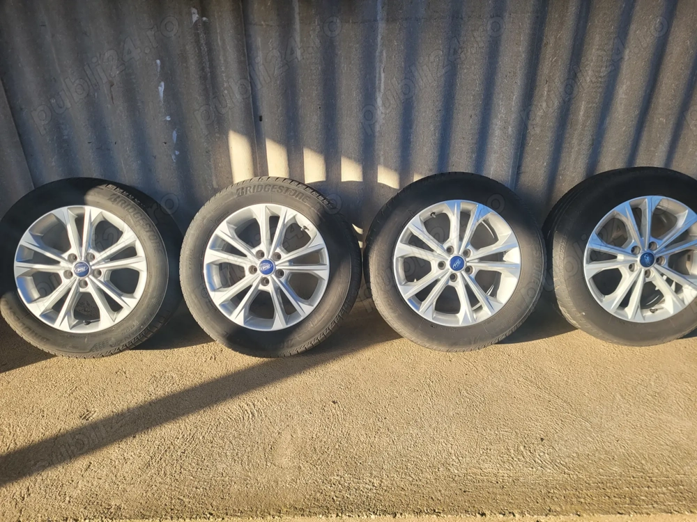Set Roti / Jante originale Ford Kuga cu anvelope de vara Bridgestone