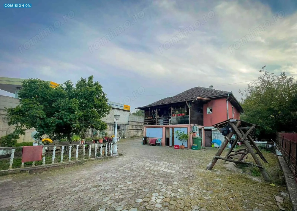 Casa 7 camere, teren 590 mp in Calnic