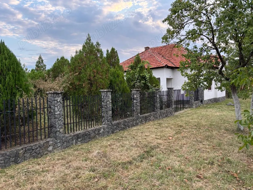 Casa de caramida cu 4 camere