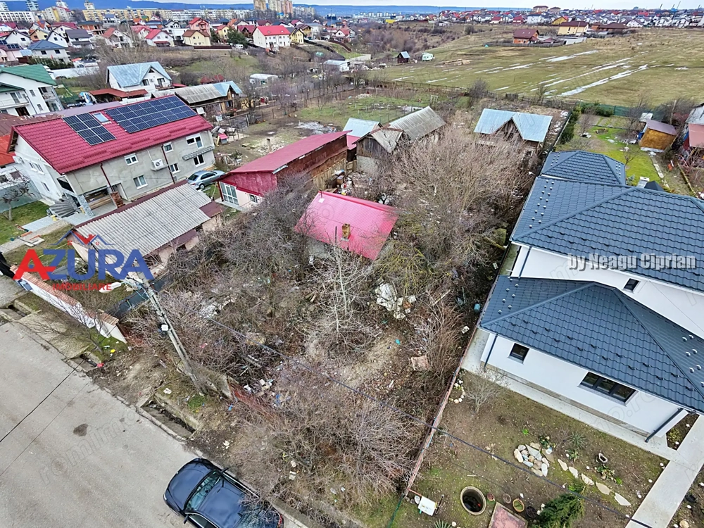 Teren 1053 mp cu deschidere 18 m – Războieni, str. Turcești