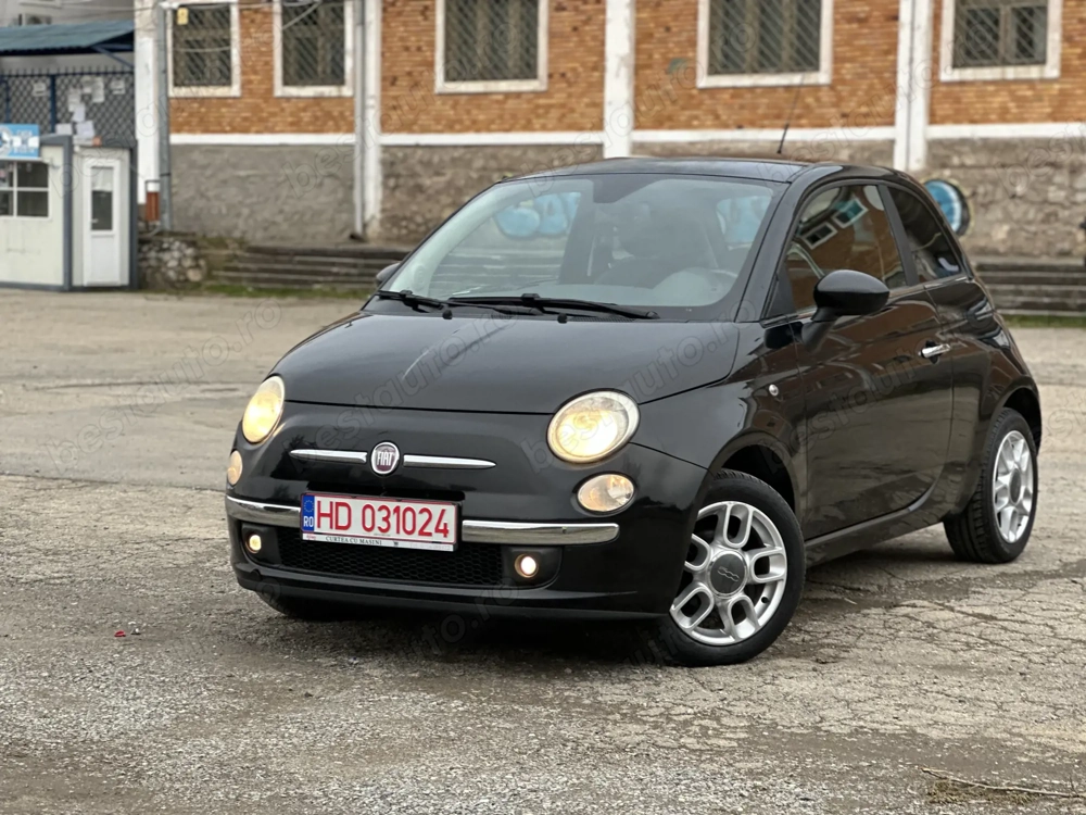 Fiat 500*km:152.125*clima*2 randuri de roti*1.3 benzina*69 cp!