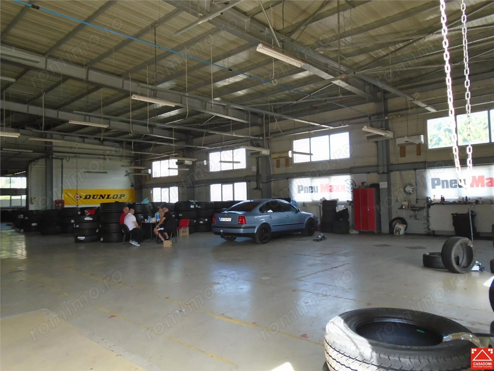 Hala in apropiere de aeroport si autostrada