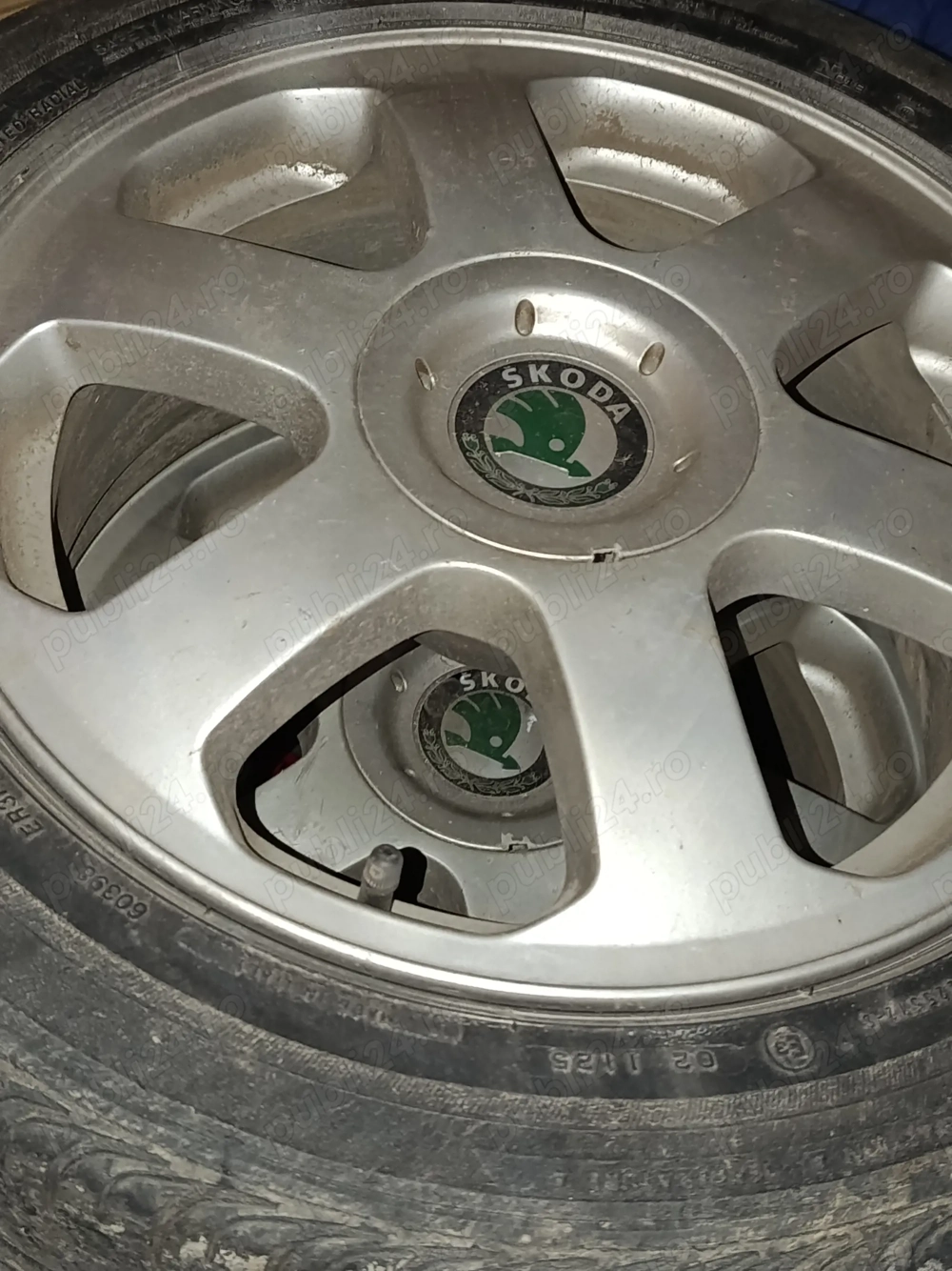 Jante originale Skoda/Design cu șase spițe cu capac central inclus!  