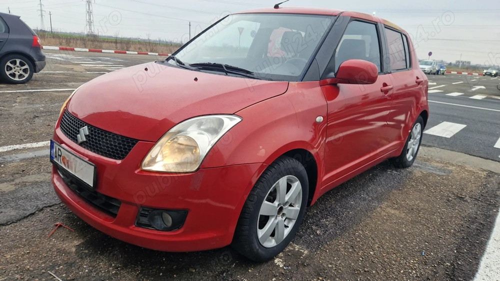 Suzuki Swift 1.3 benzina scaune incalzite