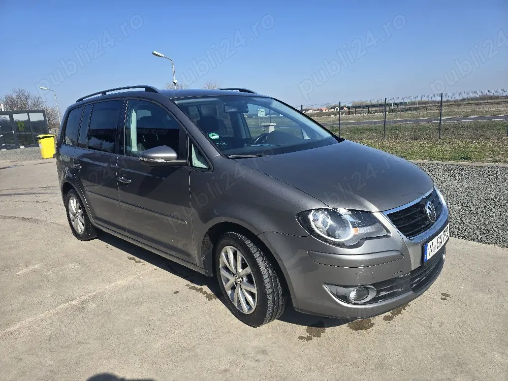 Touran 1,9 105cai,7locuri,140.000km originali
