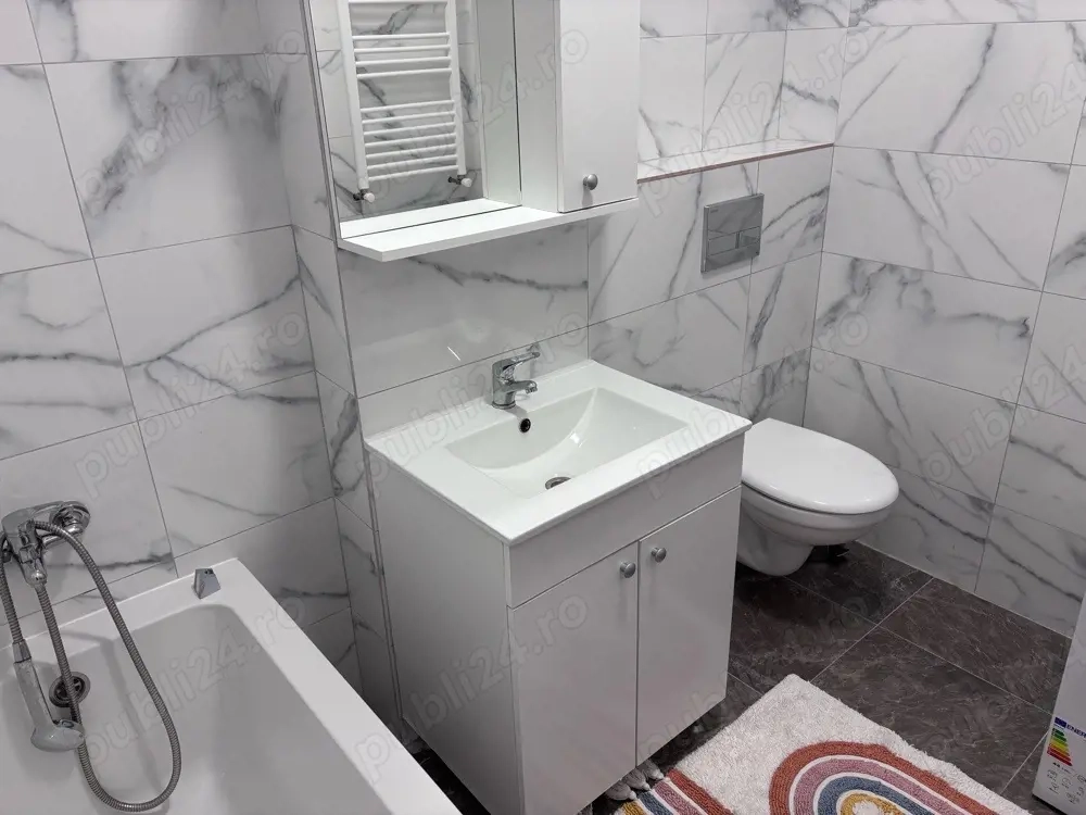 închiriez apartament nou, cu grădină