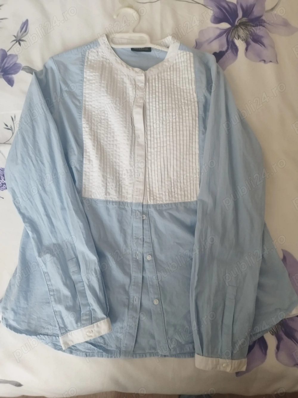 Vând camasa aproape noua.