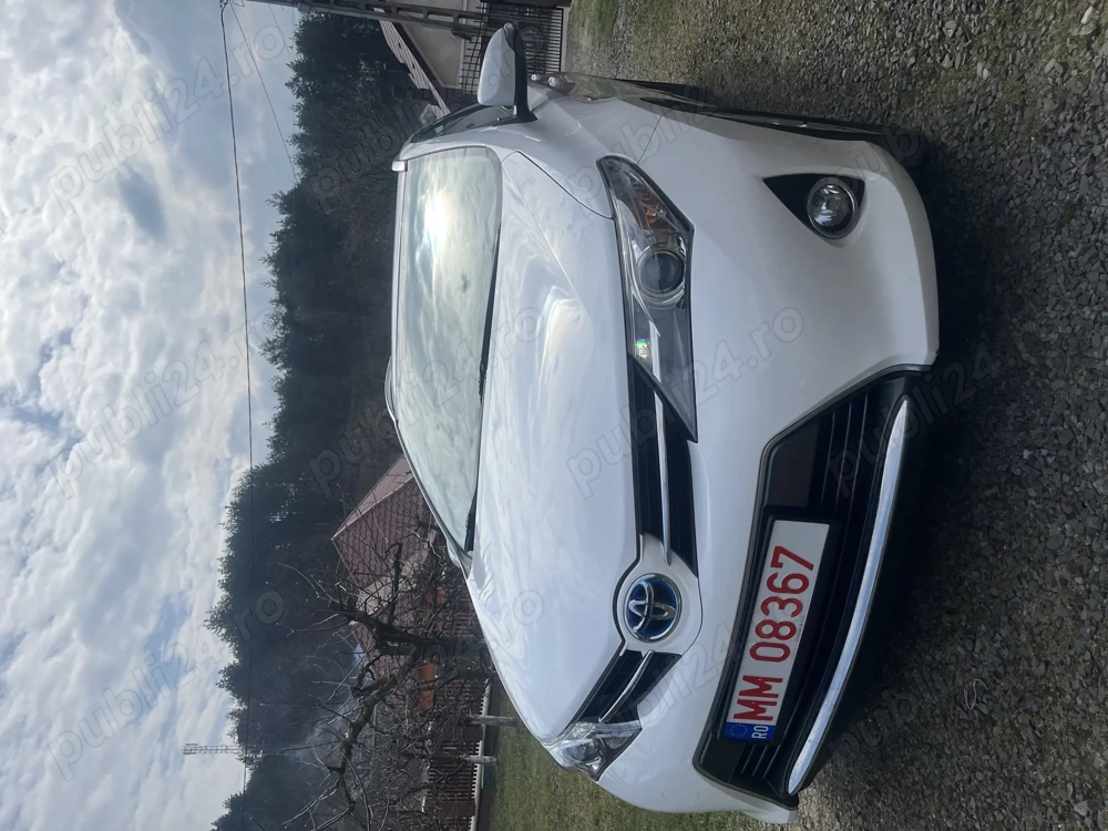 Toyota Auris 1.8 Hybrid automat .