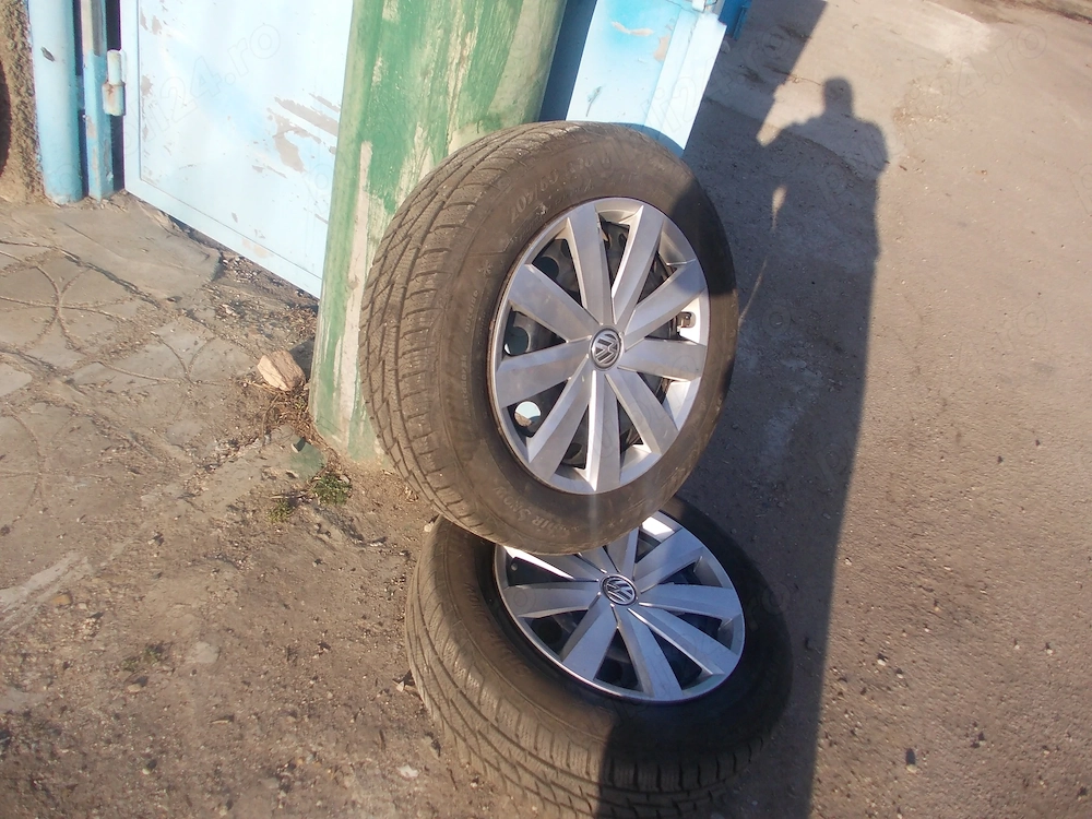 vind set de 4 jante cu anvelope de iarna si capace 205-60-16