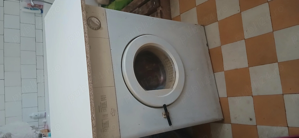 Masina de uscat rufe