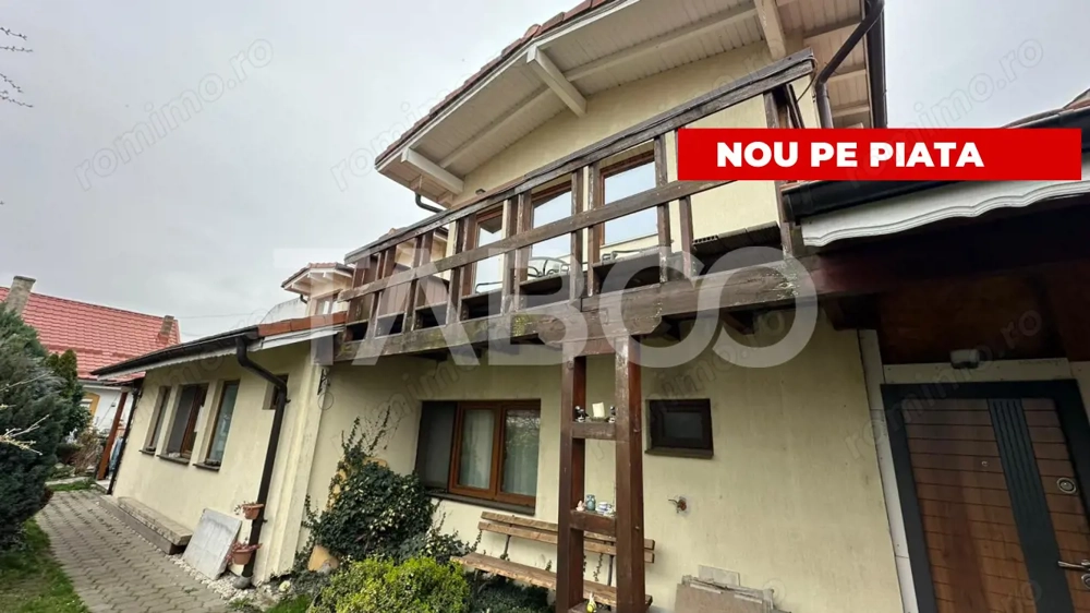 Casa cu acces auto cu 2 apartamente separate garaj  Piata Cluj Sibiu
