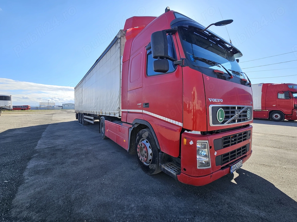 Ansamblu Volvo FH440 cu remorca SCHMITZ