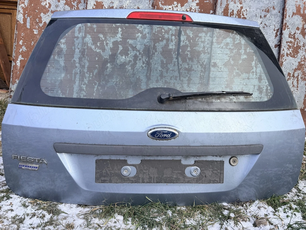 vand diferite piese ford fiesta 14 benzina 2007