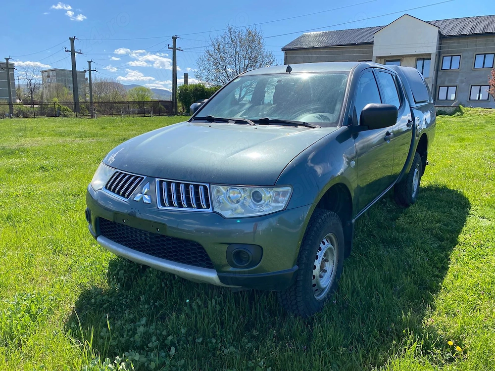 Mitsubishi L200. 2014