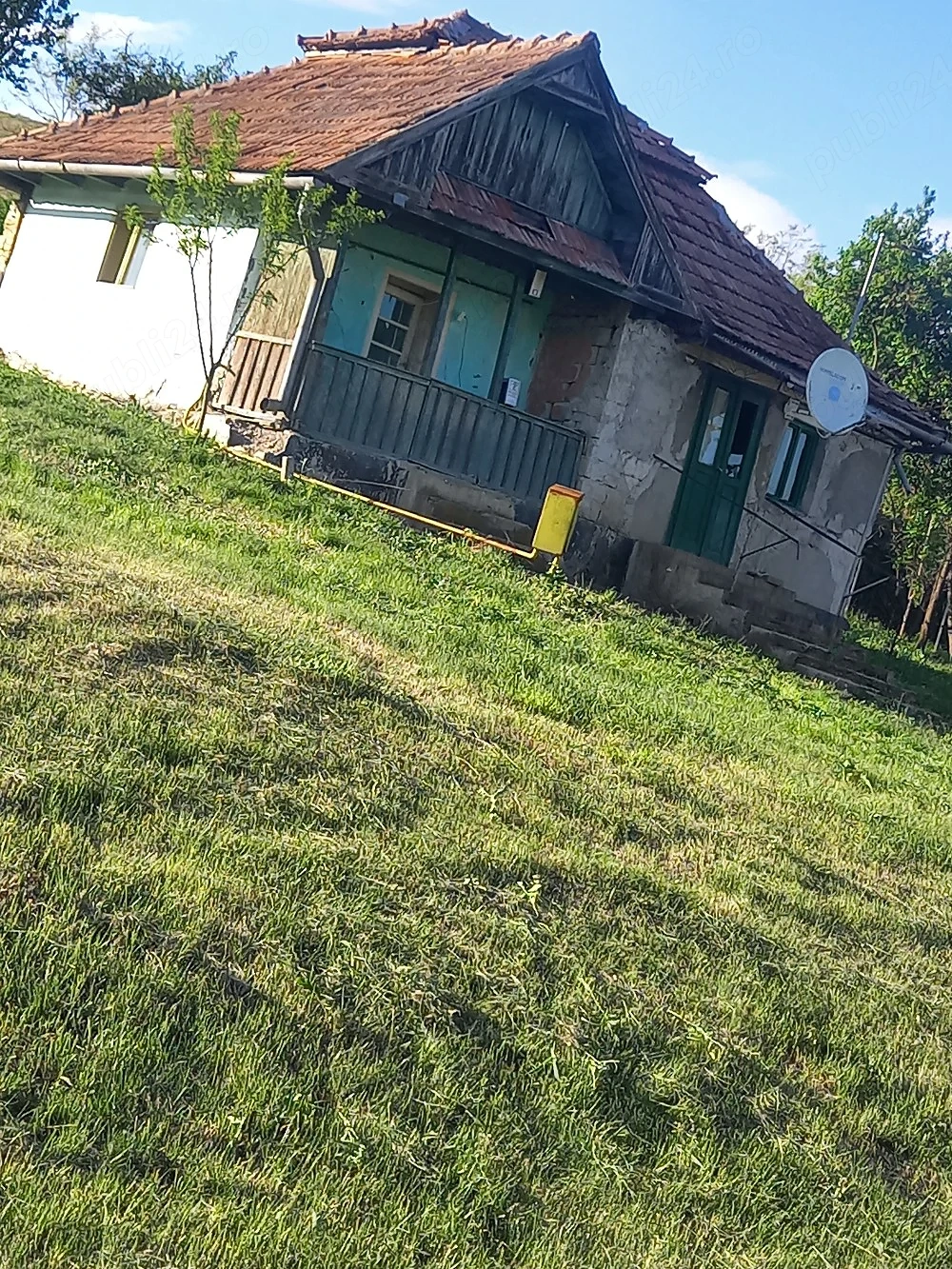 casa la tara de vânzare 