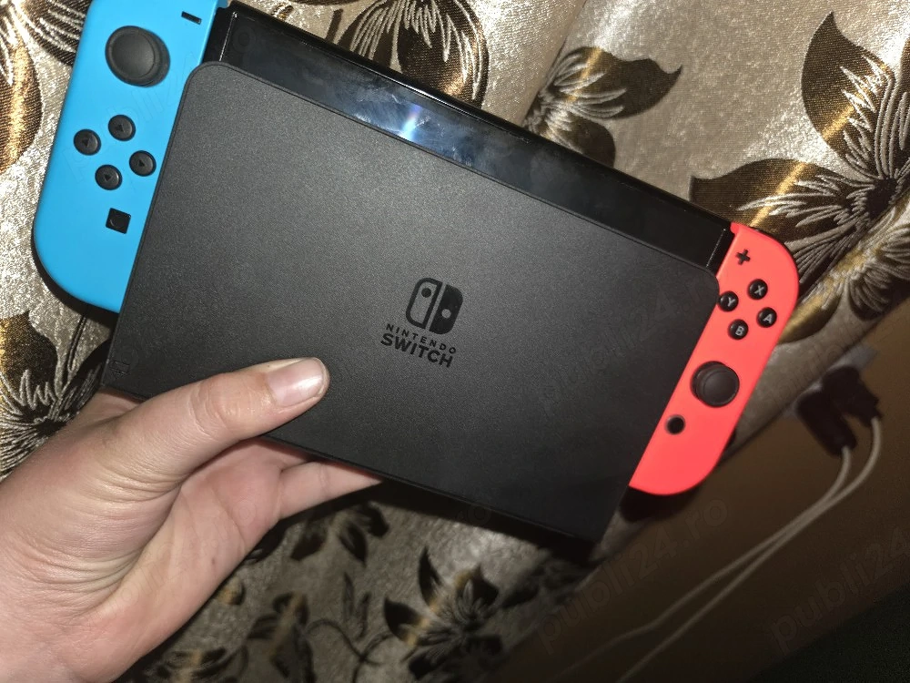 vând nintendo swich impecabil
