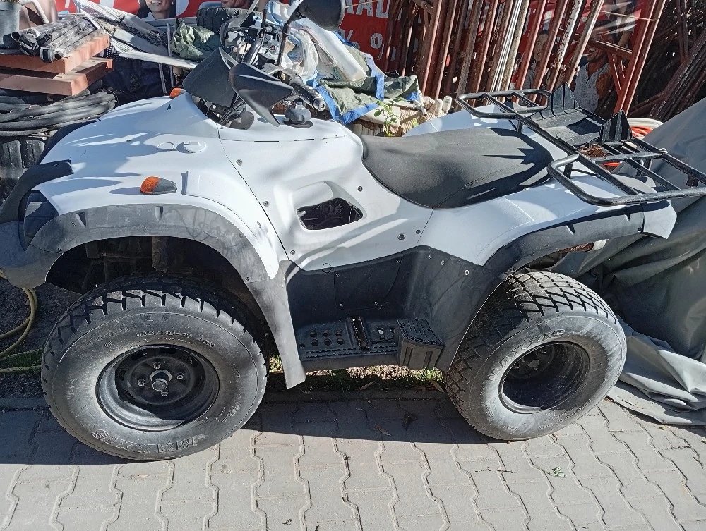 vând ATV tgb 325 2010 adus din Germania 