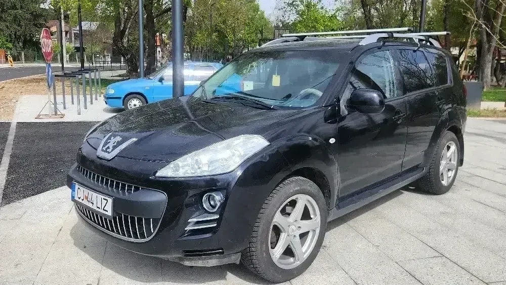 compensez  schimb cu auto mai scump Peugeot 4007 4x4 hi-low 7 locuri 