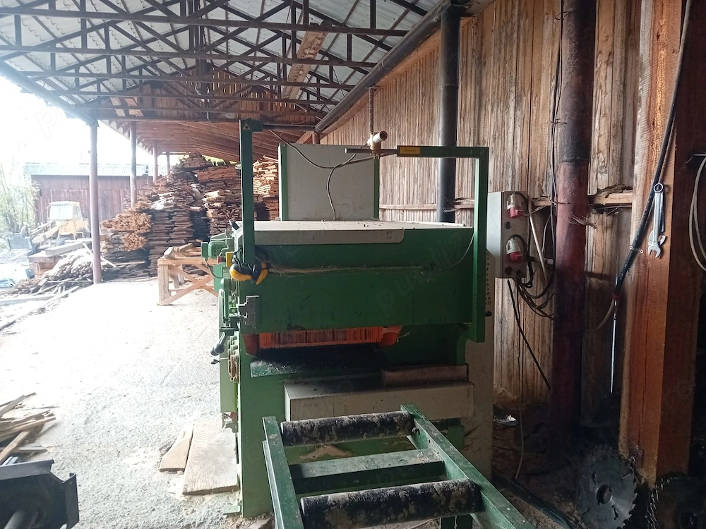 Multilama nemteasca cu rola de evacuare cu descarcare stanga