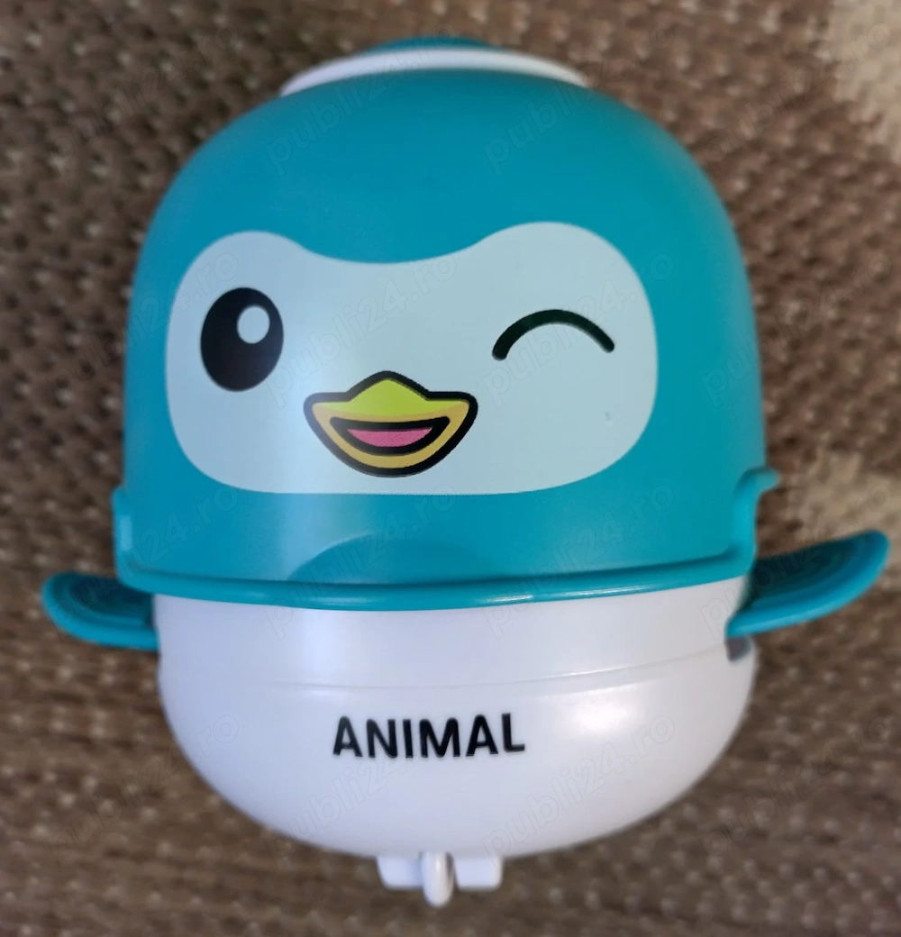 Pinguin mecanic cu rotite Animal