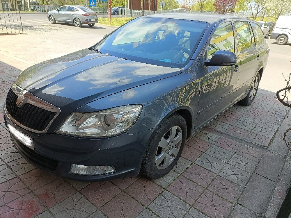 Skoda Octavia 2009 1.4 benzina 122cp ( lant intins)