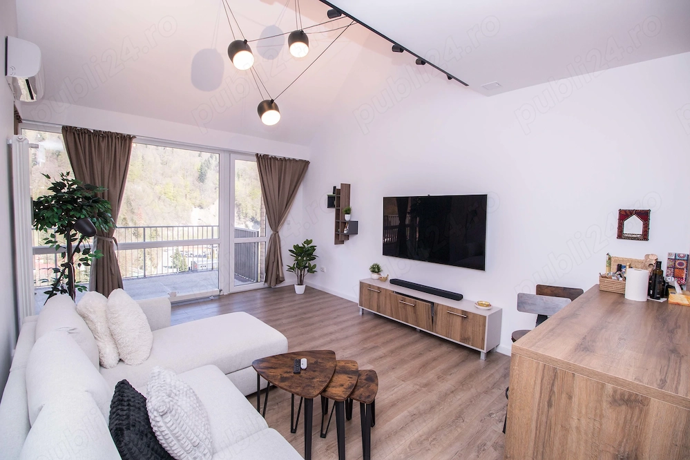 Apartament cu scara interioara + loc de parcare inclus de vanzare in Sinaia 