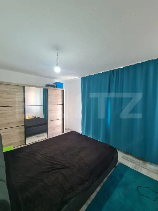 Apartament decomandat, 51 mp utili, lift, parcare inclusa in pret, zona Terra