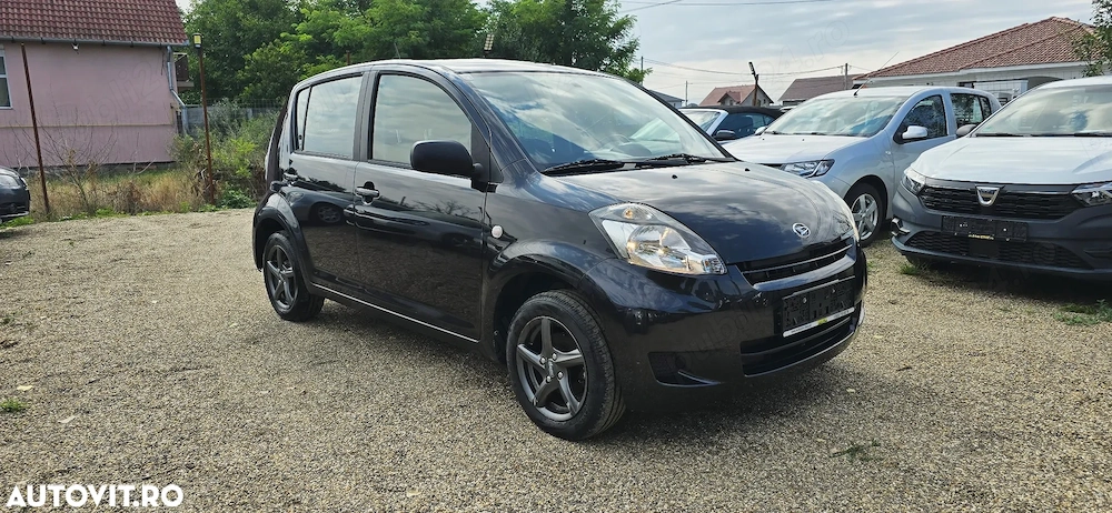 Daihatsu Sirion 4x4  an 2009 motor 1300 cm3 benzina clima 