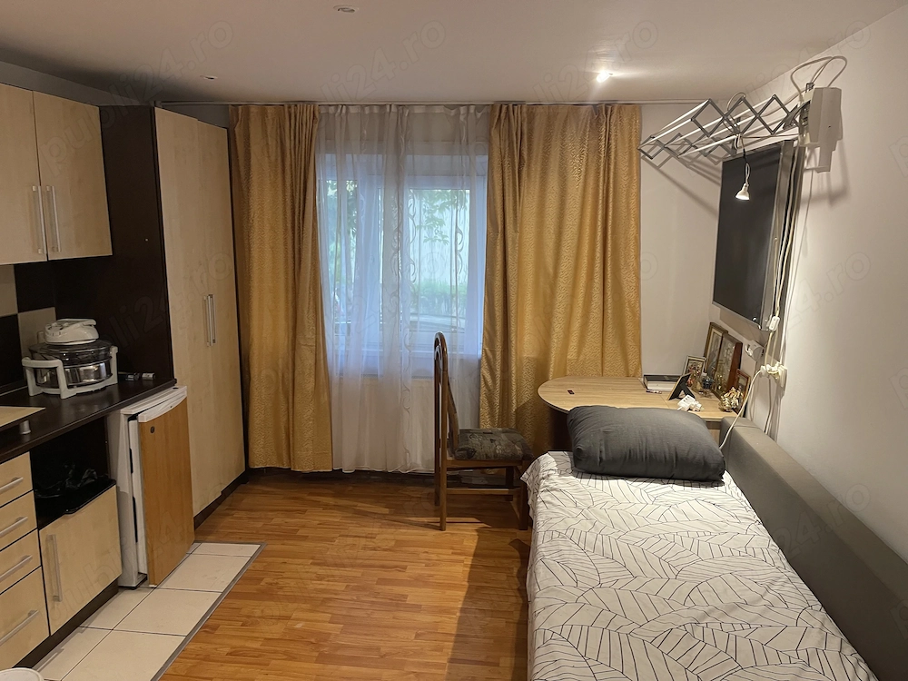 Închiriez GARSONIERĂ cochetă 