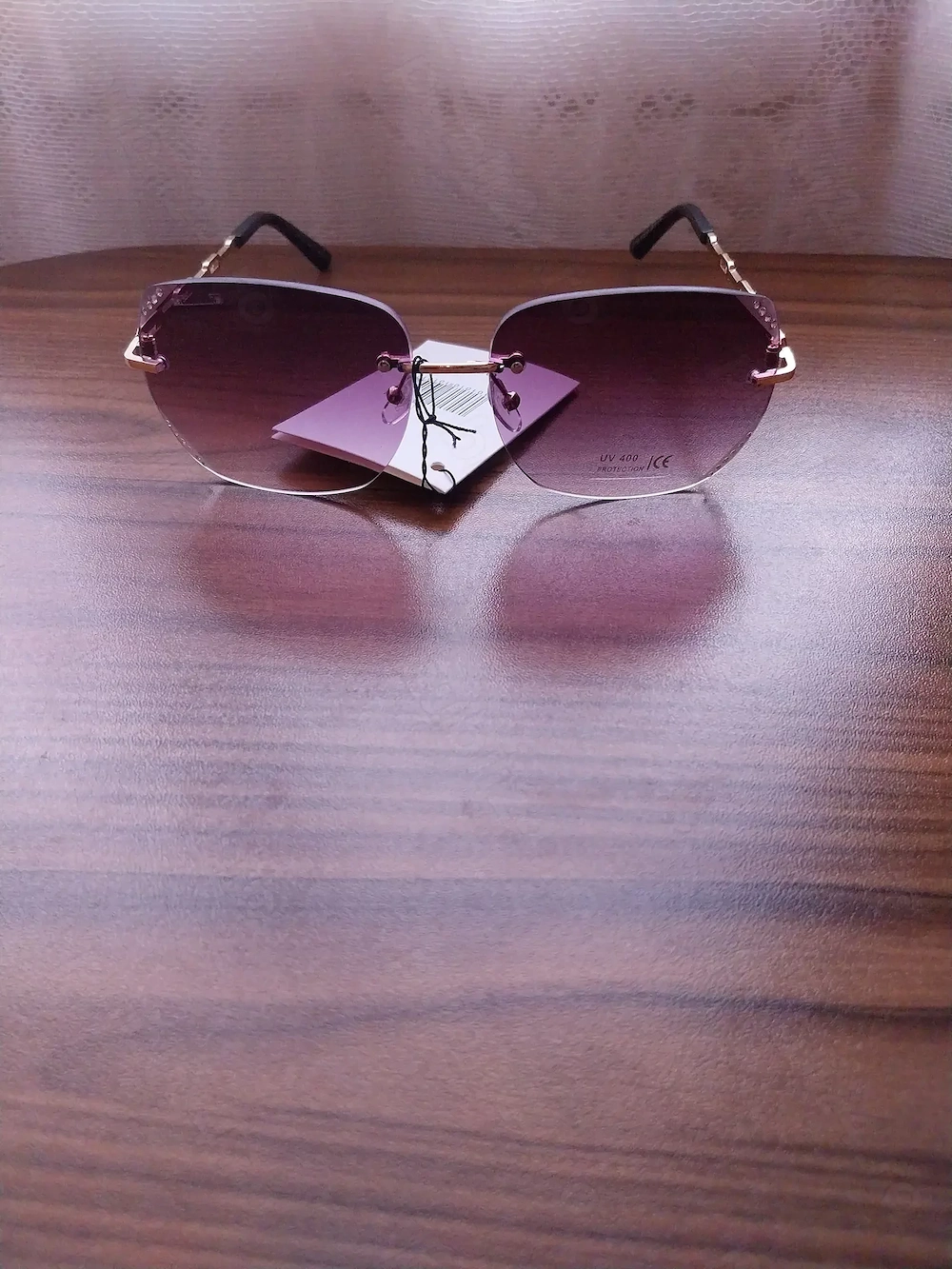 Ochelari de soare damă, fără ramă (rimless), detalii aurii - NOI