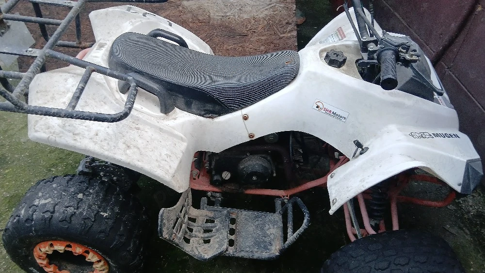 atv de 124cc  foarte bun de mers cu el prin padure si camp