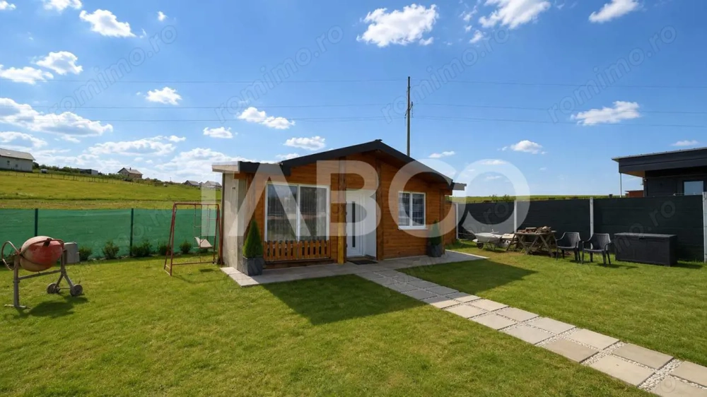 Teren de vanzare 500 mp + cabana la cheie cu utilitati Sura Mare