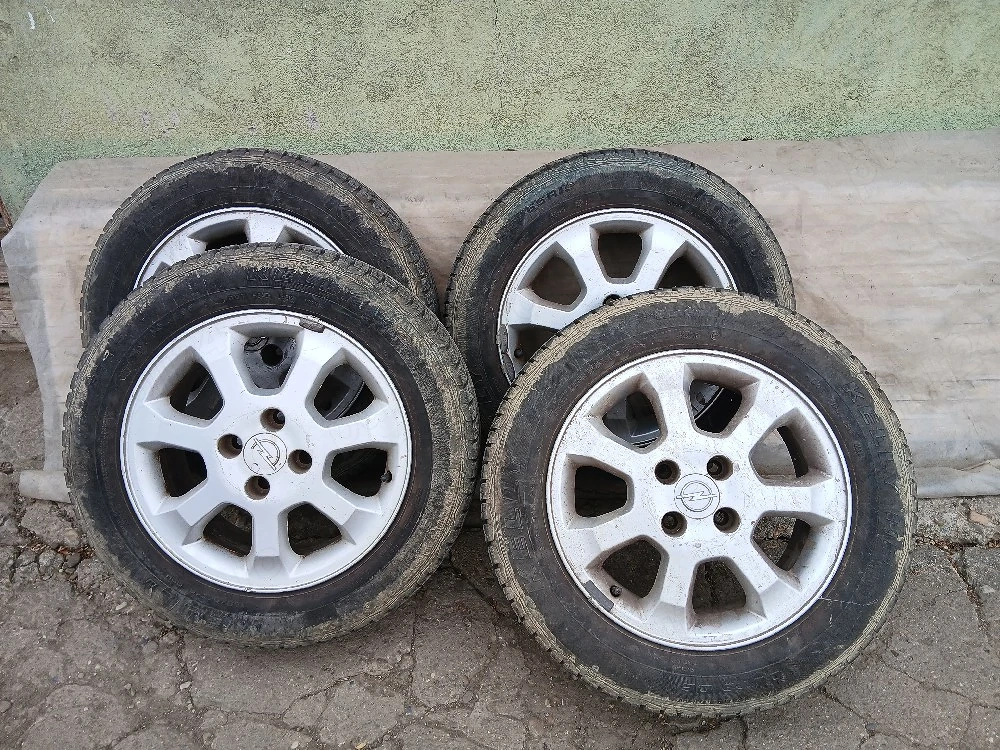 4 Jante cu cauciucuri Opel 185 65 R15 aproape noi