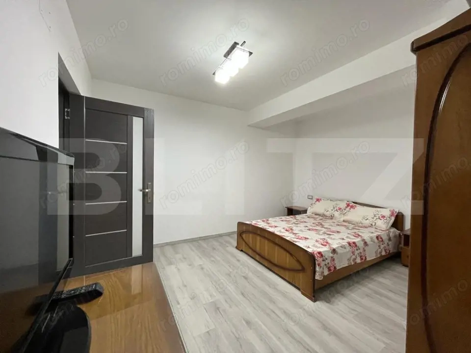 Apartament modern cu două camere, centrala si loc de parcare privat