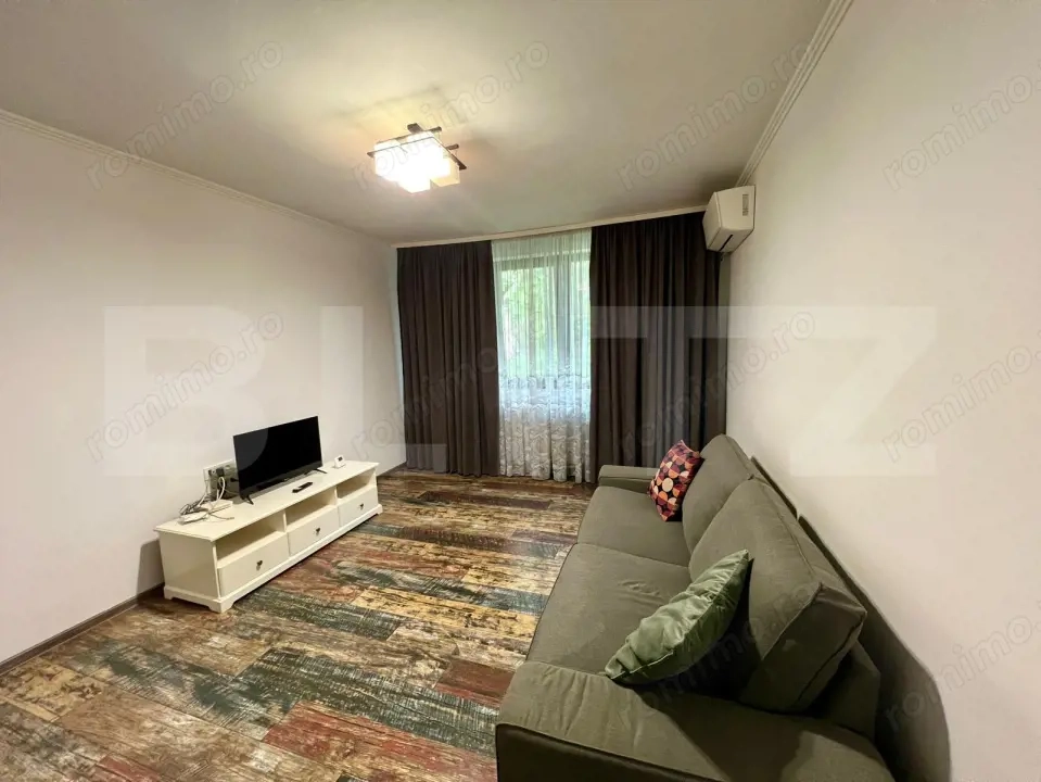 Apartament cu 2 camere, parter, centrala si AC, zona centrala