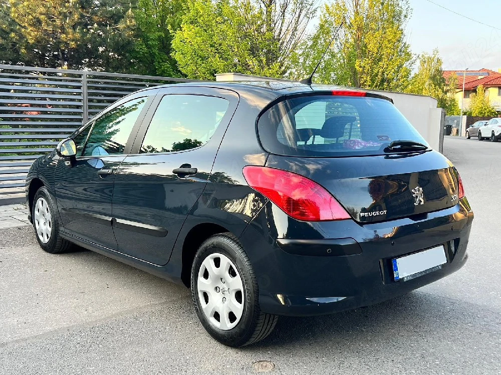 Peugeot 308 Motor 1.4 benzină cumpărat din reprezentanță în 2010, a stat în show