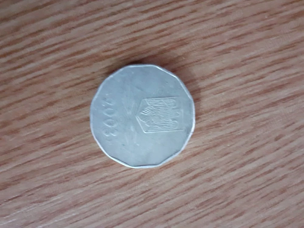 vand  moneda 