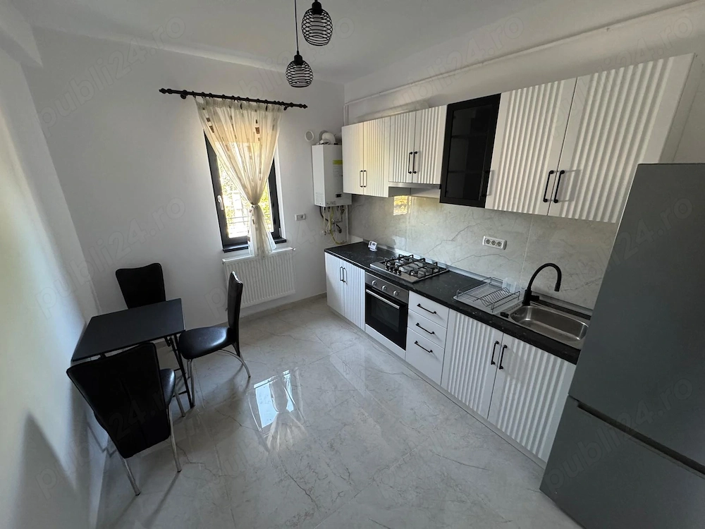 Închiriere Apartament (persoana fizica) 2 camere decomandate 54 m2 în bloc 2025 cu teren aferent