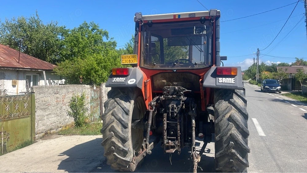 Tractor SAME laser 100 cu încărcător și plug Huard cu trei brazde