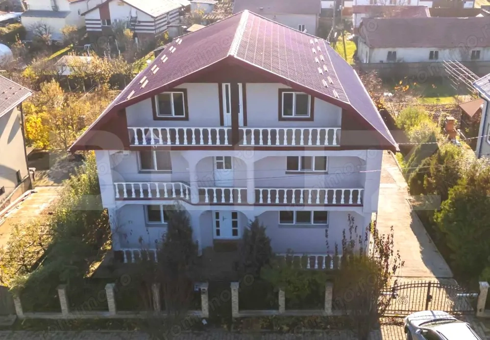 Casă  cu 2 apartamente, mansardă și teren 1000 mp – Tomești 
