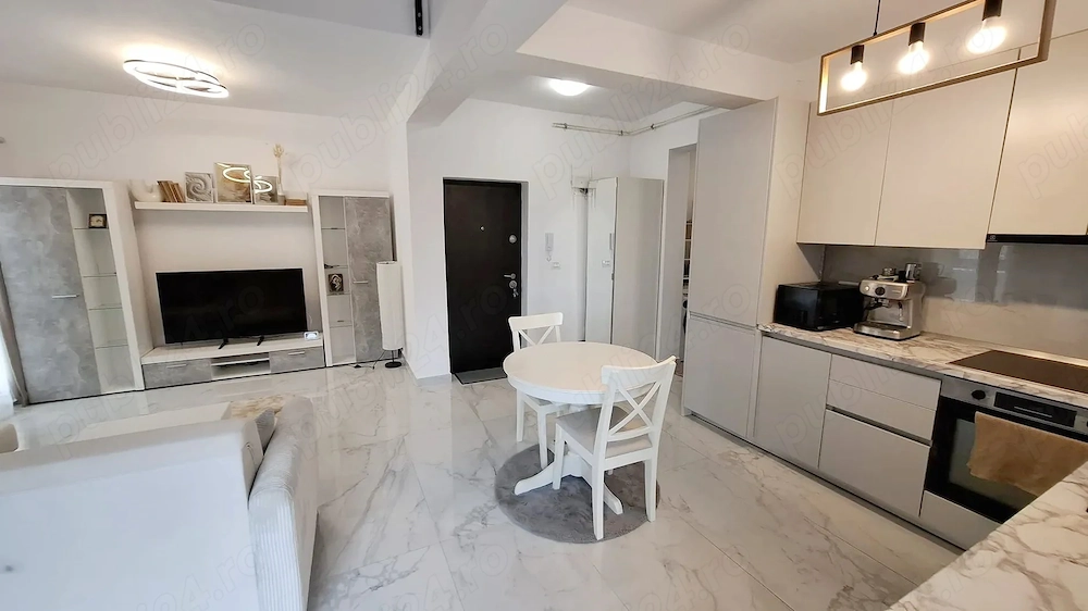 Ap.3 camere - 2 niveluri (scara interioara) - 83mp - bloc nou - mobilat si utilat - parcare inclusa