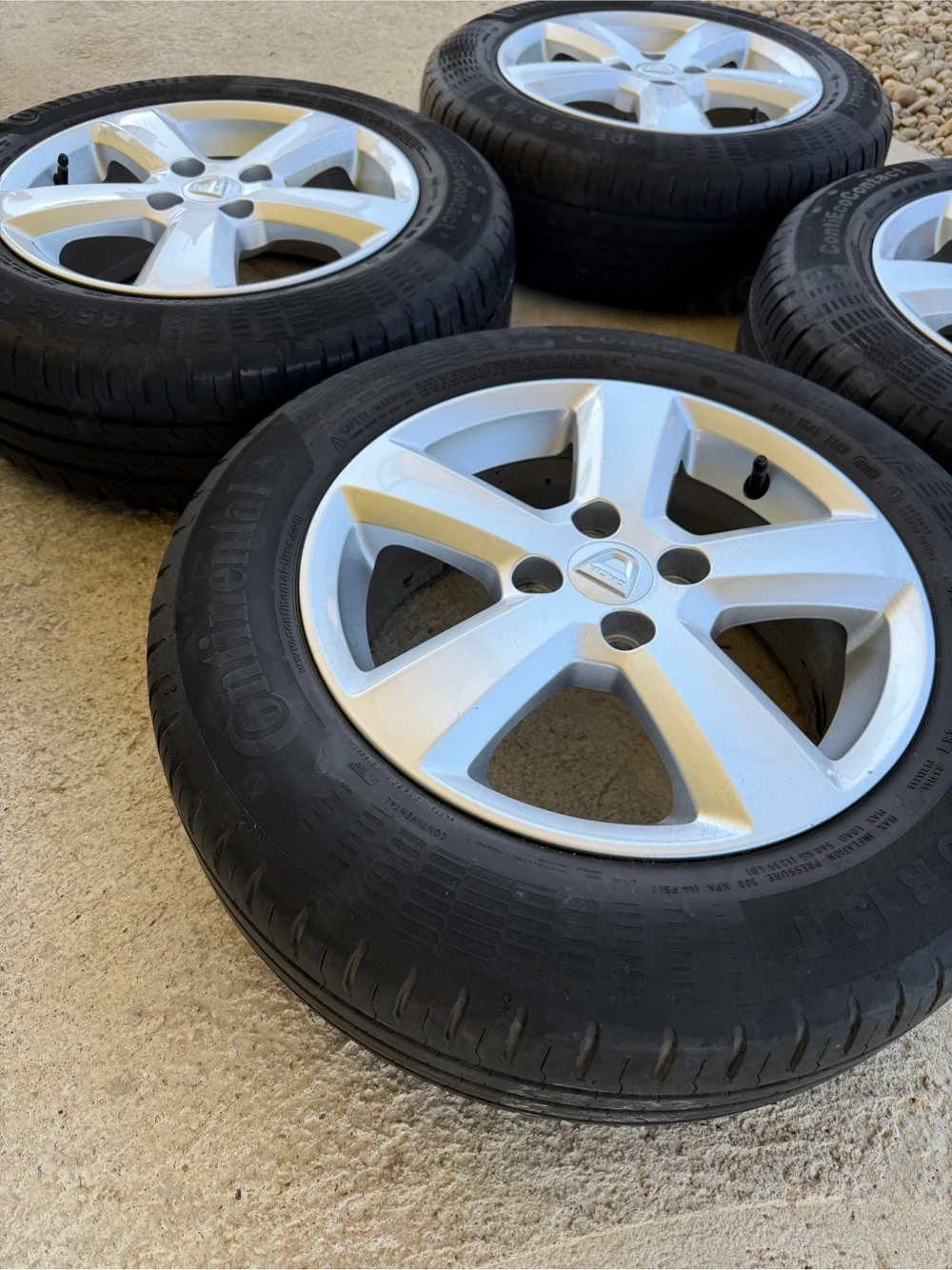 Jante originale + cauciucuri Continental 185/65/R15 pt Logan MCV Sandero
