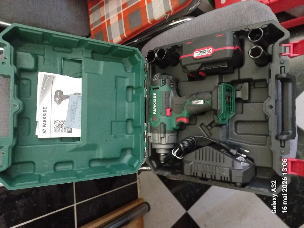 Pistol  Parkside cu impact de roti cu acumulator de 4ah si incarcator .