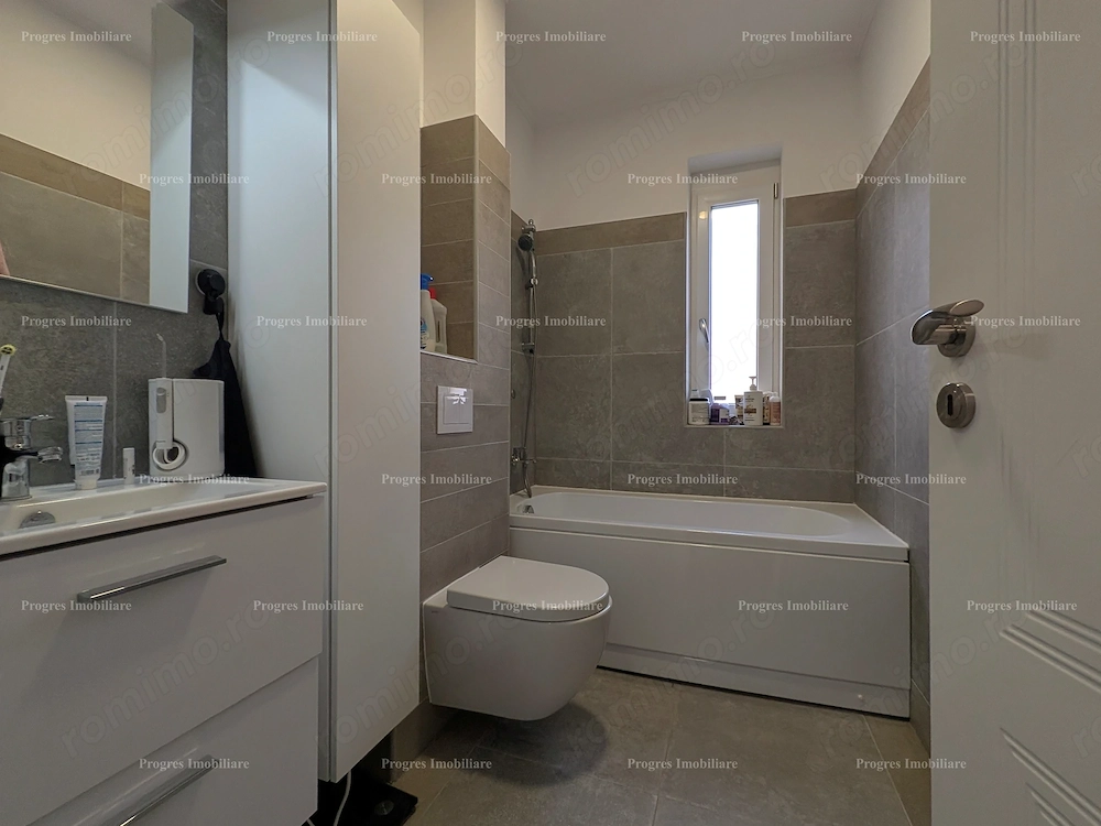 Ap.2 camere - mobilat si utilat - bloc nou - etaj 1 - parcare inclusa