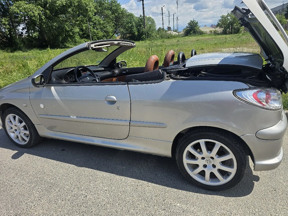 vând Peugeot 206.