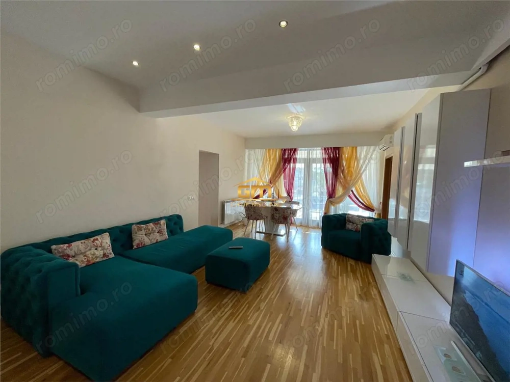 Apartament 2 camere de vanzare - zonă centrală, bloc nou, terasă generoasă și garaj subteran