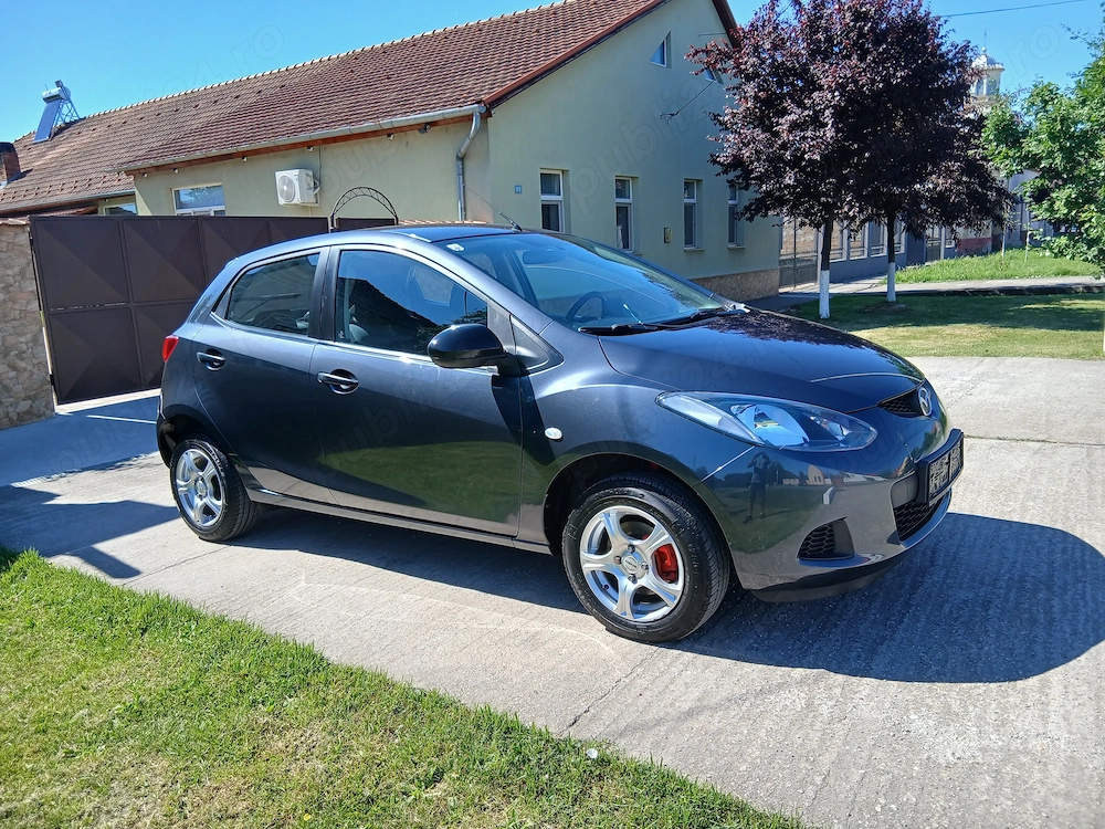 Mazda 2 an 2010 benzina 1.3 klima distribuție lanț 147000km