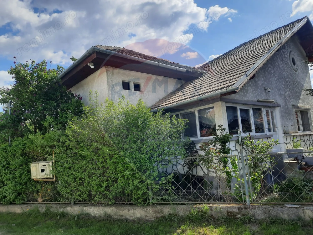 Casă langa Fagaras cu teren de 1836mp si parau in spatele curtii