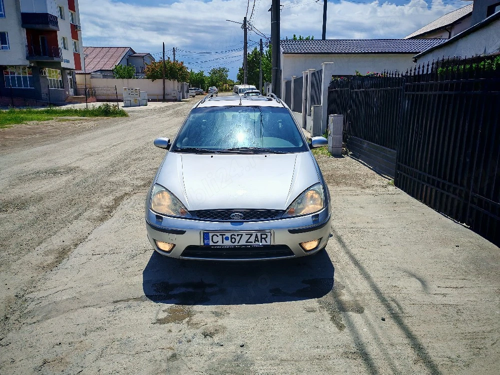Ford focus benzina 1.6 impecabil 1250 e .